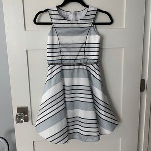 Striped dress with belting detail.